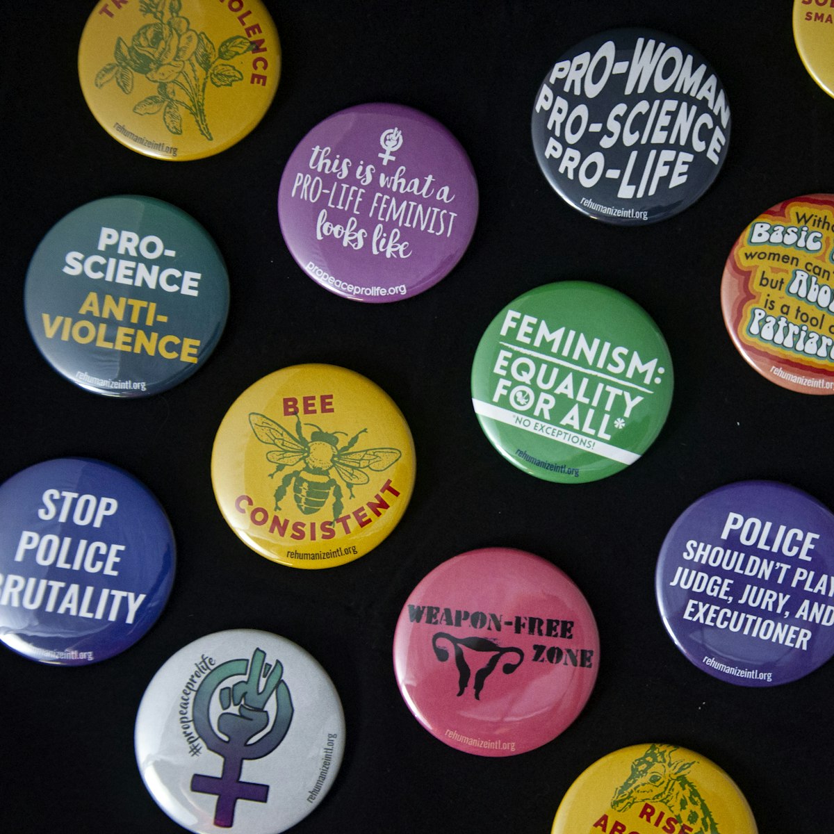 Assorted round pin-back badges