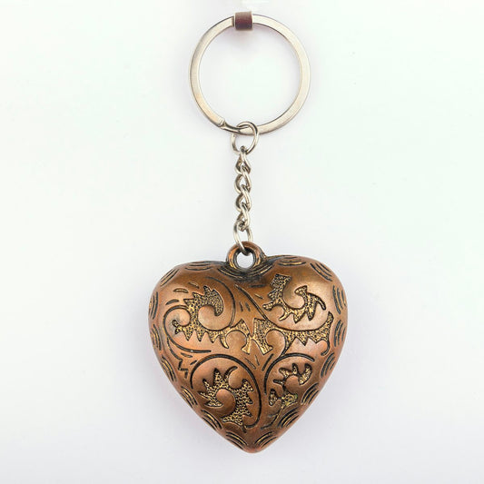Heart-shaped keychain hanging from a chain